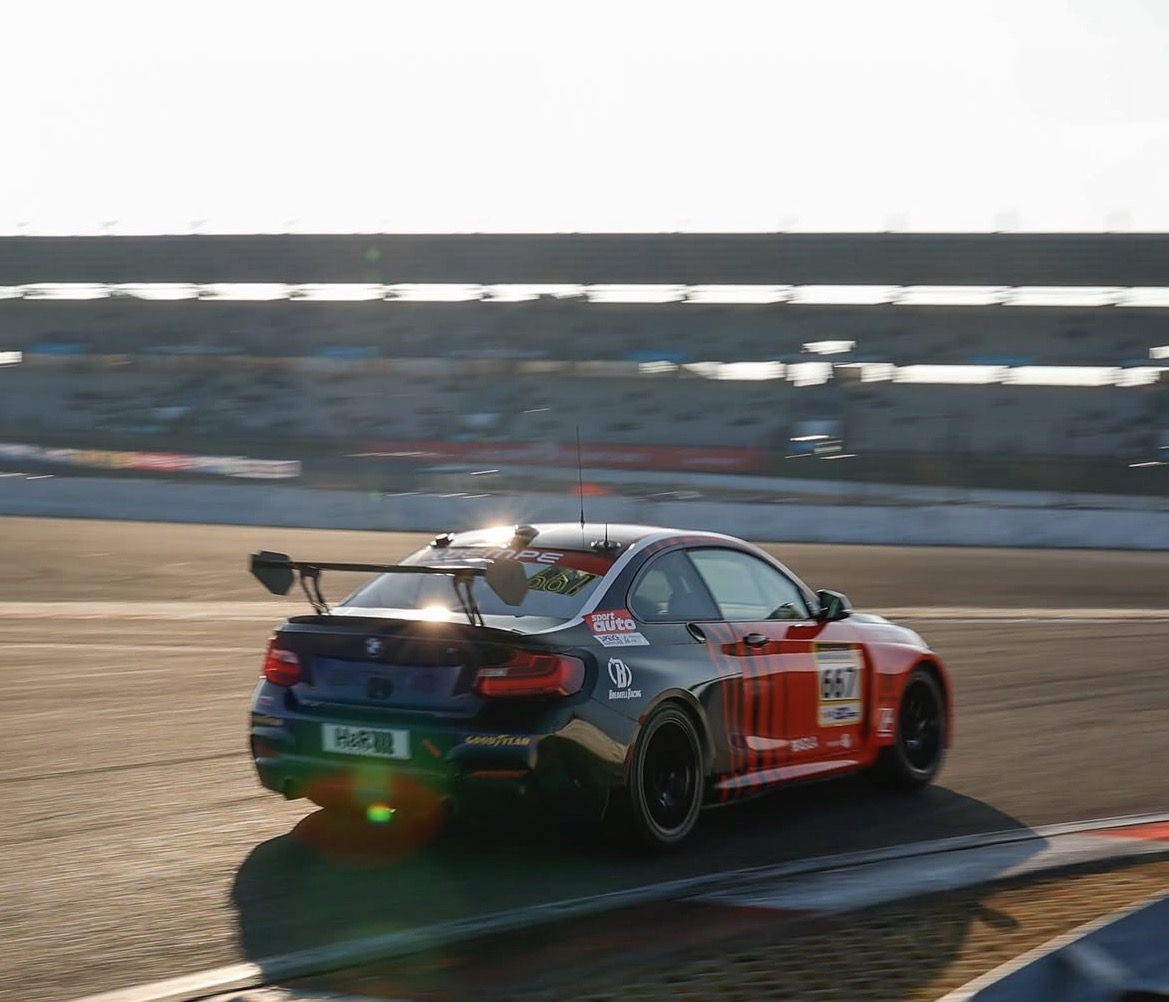 BMW M235i rear at sunset